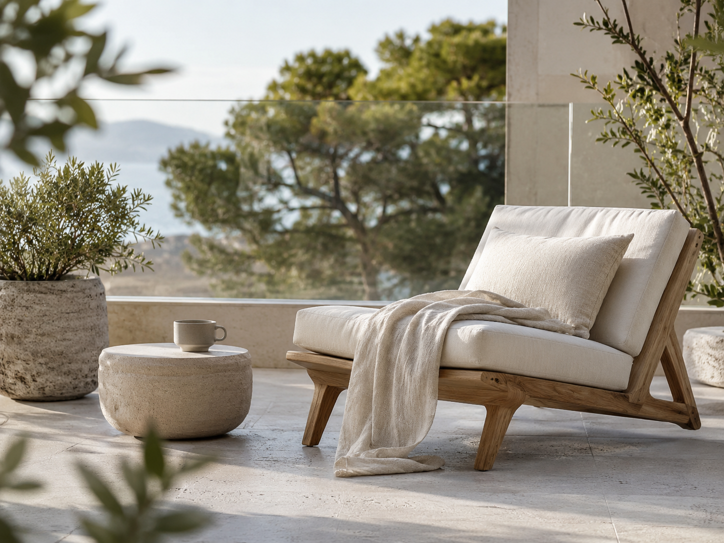 NORLUA singing bowl on a coastal terrace beside a lounge chair