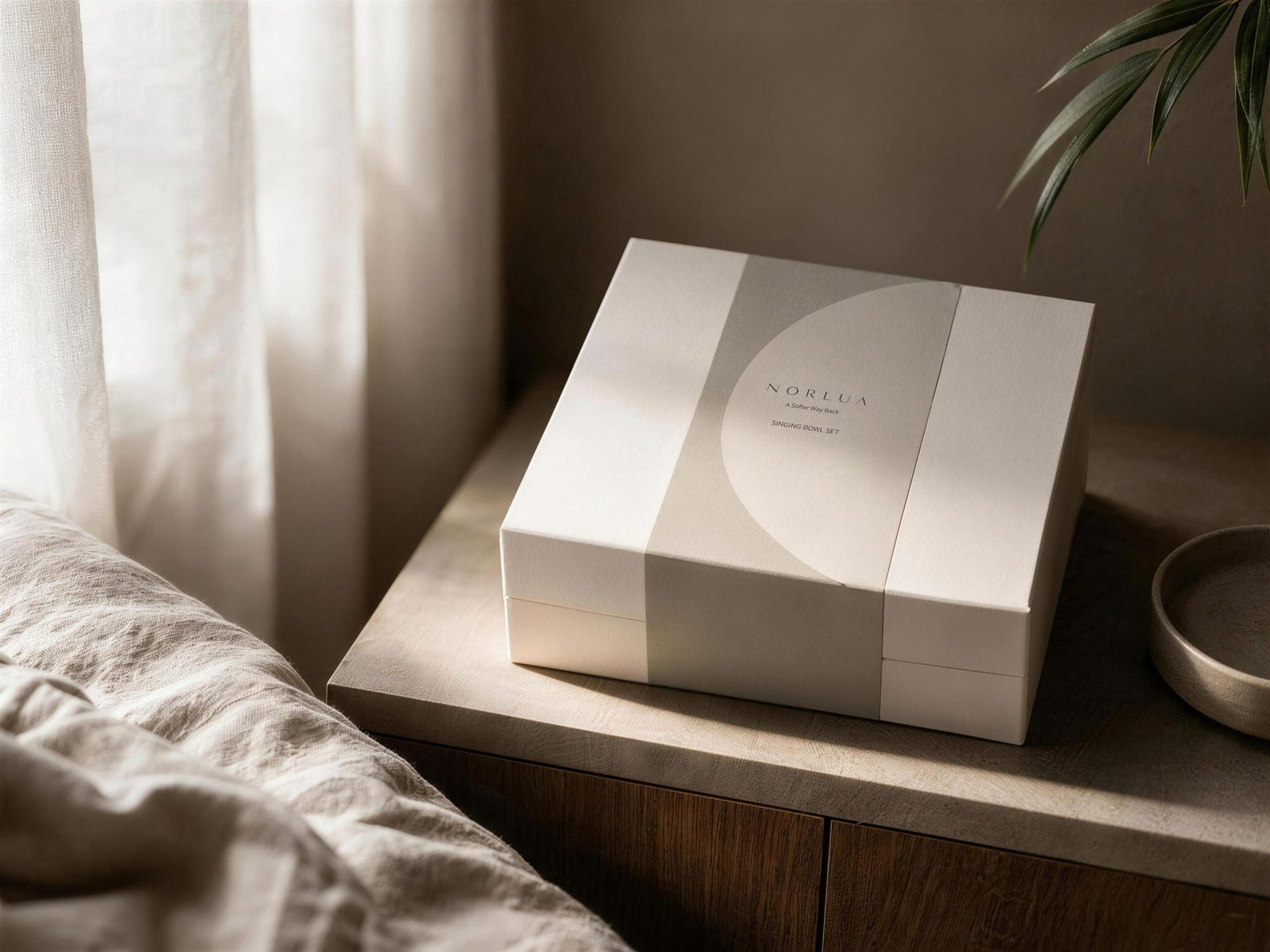 NORLUA singing bowl presentation box in a quiet modern home