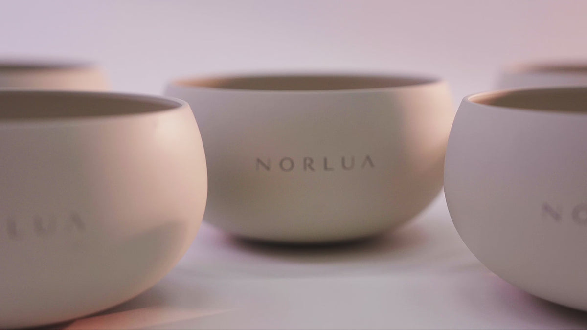 NORLUA Warm Ivory singing bowl demonstrating its natural tone and resonance
