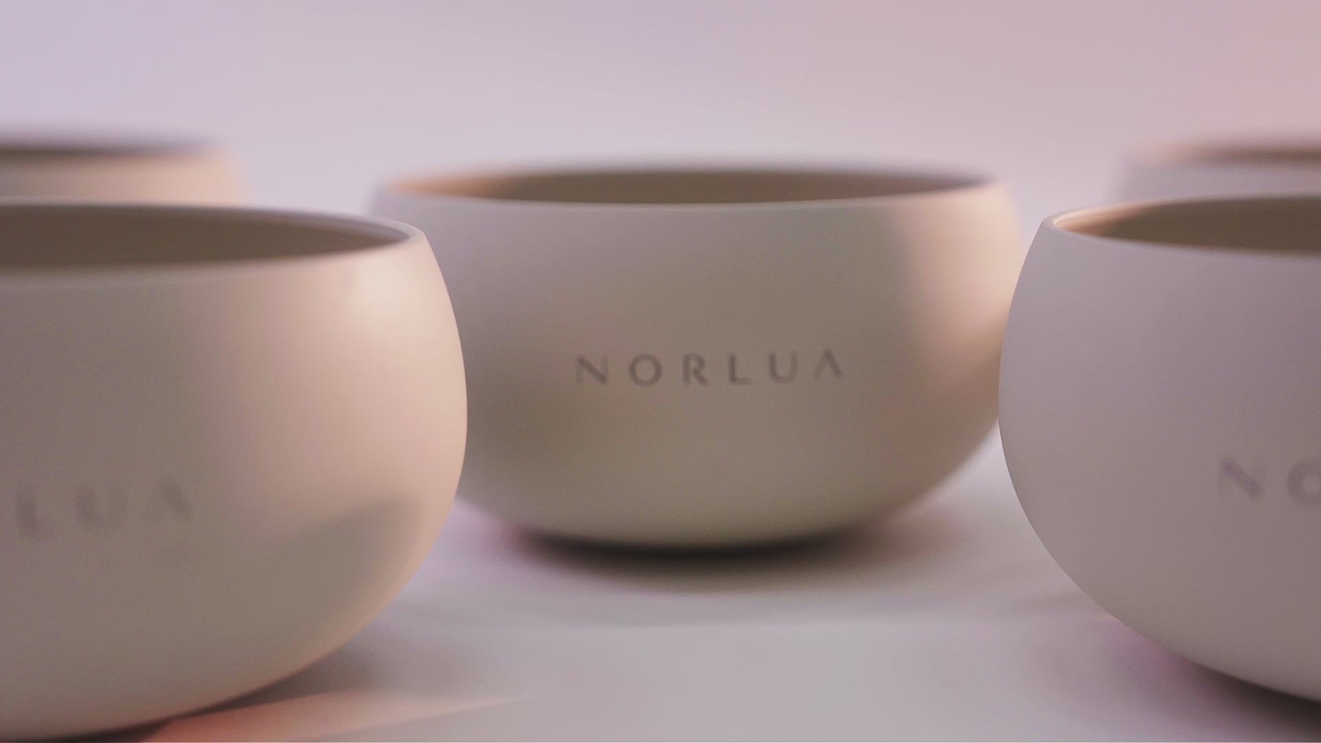 NORLUA Warm Ivory singing bowl demonstrating its natural tone and resonance